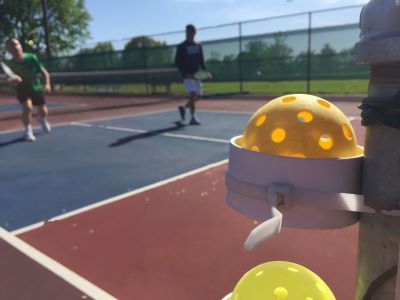 Playing Pickleball on Tennis Court