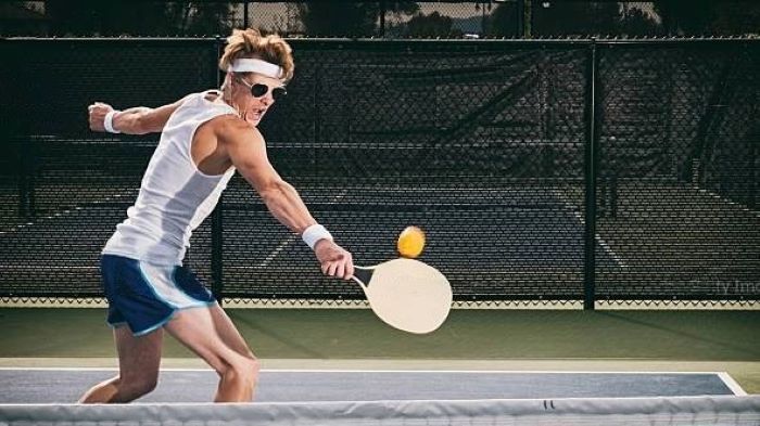 hitting a pickleball with your hand