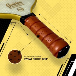 Saddle Brown Colored Perforated Cushioned Grip Of A Golden SingleShot Pro Pickleball Paddle